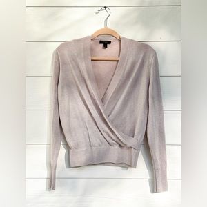 J Crew wrap sweater in a pale pink and touch of sparkle. Size small.